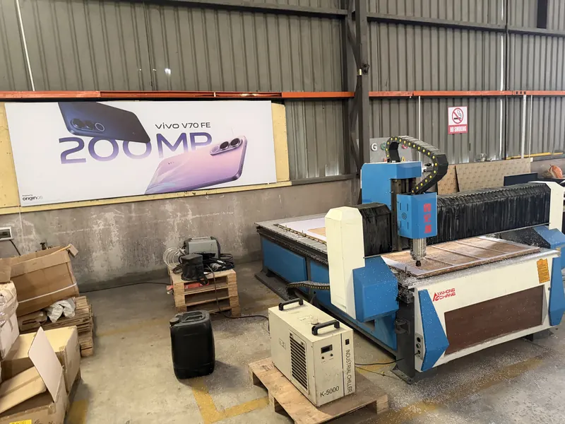 CNC router with its dust extractor.