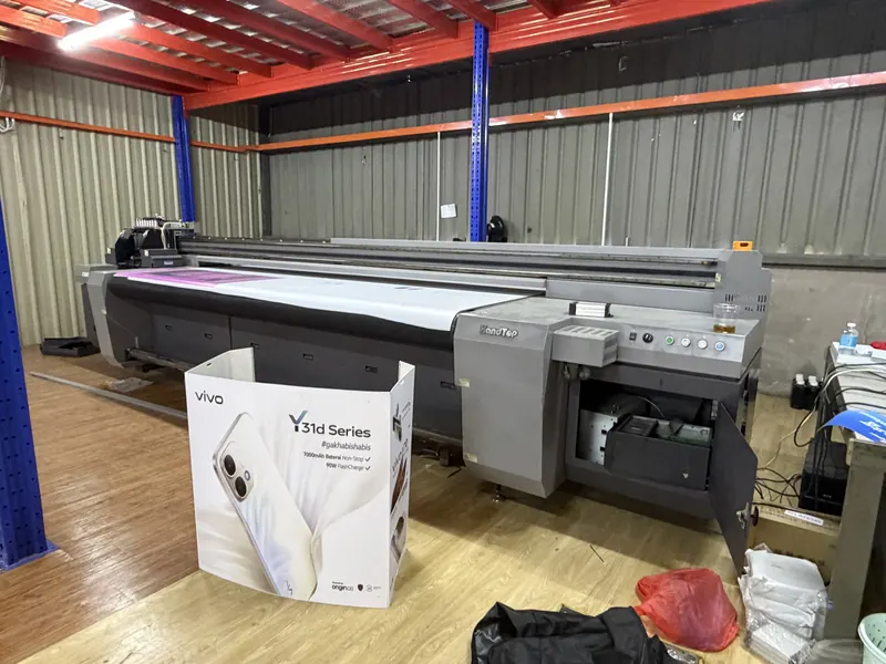 UV flatbed printer, with display units waiting to go out